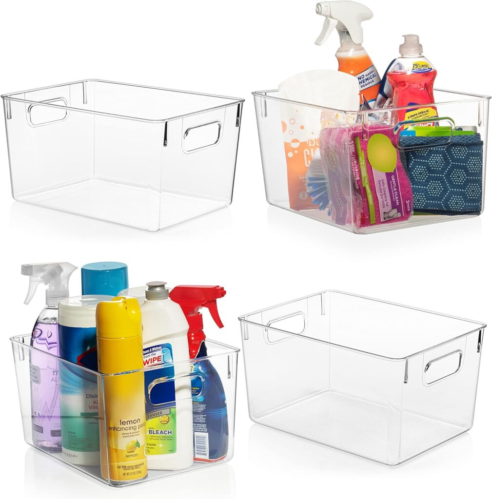 Four medium sized bins holding cleaning supplies and sponges.