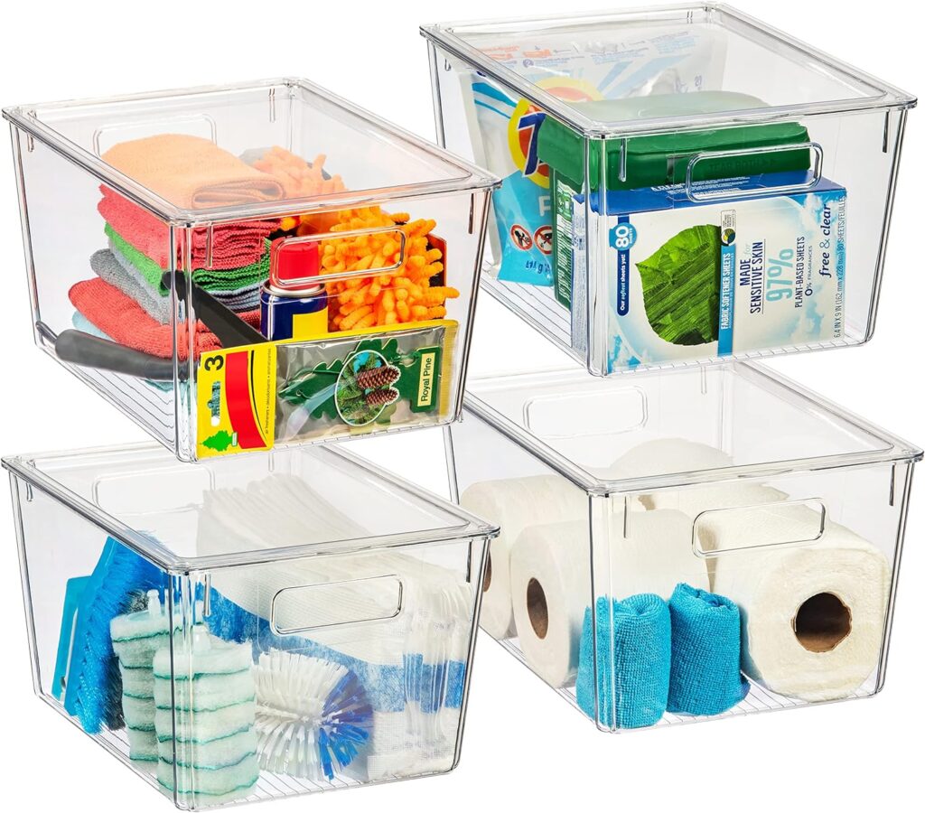 Set of 4 bins with lids each filled with cleaning supplies.